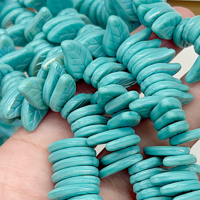 CRISTAL CHECO VERDE AGUA HOJAS 14X9MM (X TIRA)