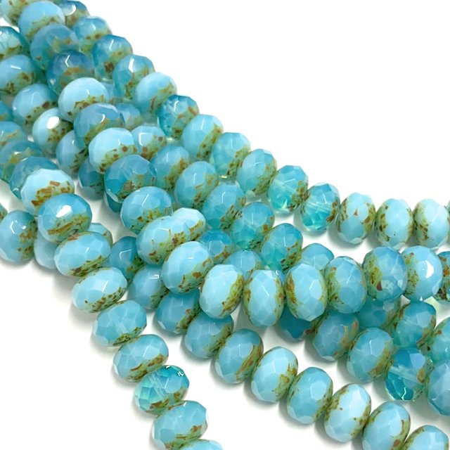 CRISTAL CHECO CELESTE DONA FACETADA 9X13MM (X TIRA)