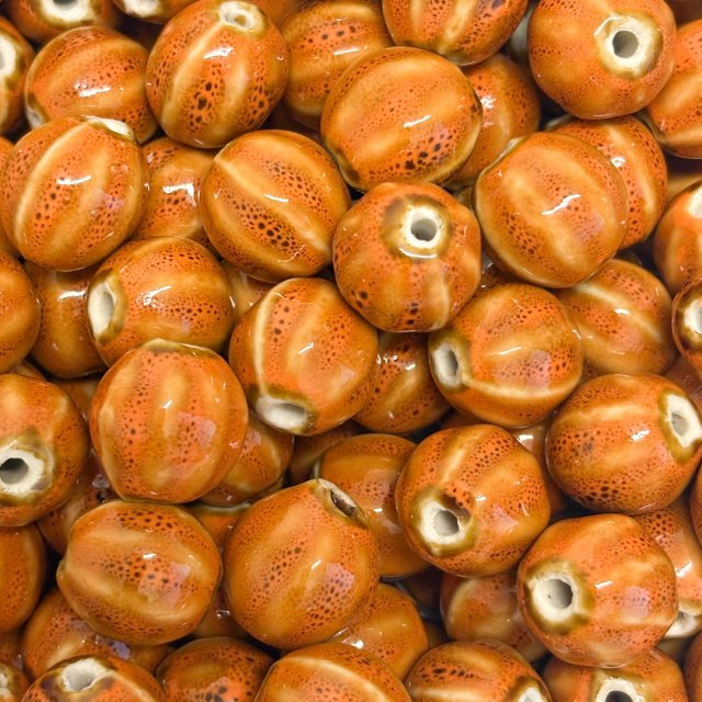CERAMICA BOLITA IRREGULAR 16MM - NARANJA